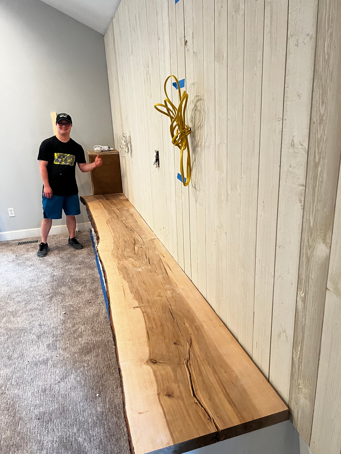 Custom Built-In Entertainment Wall with Live Edge Wood Shelving