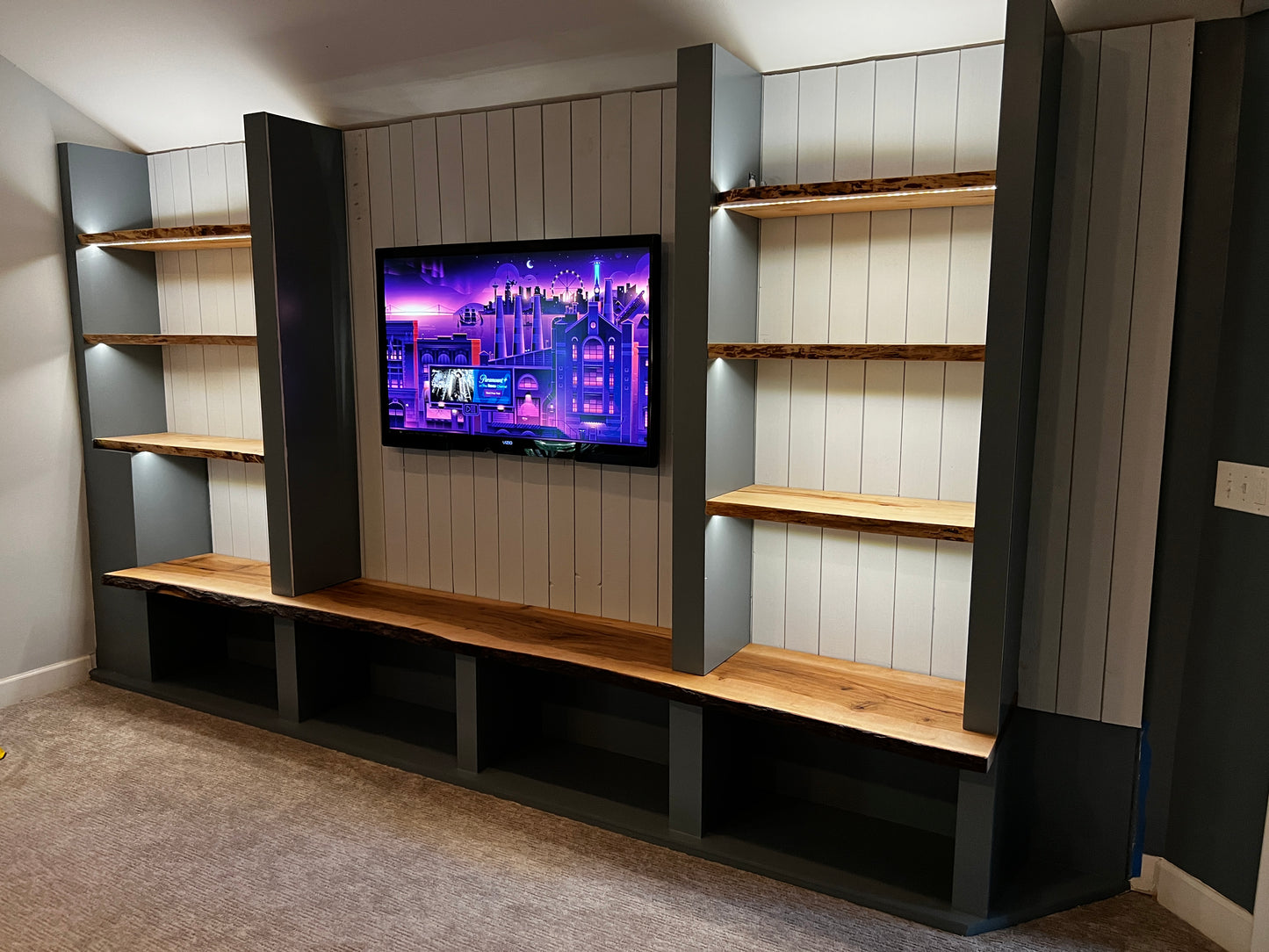 Custom Built-In Entertainment Wall with Live Edge Wood Shelving